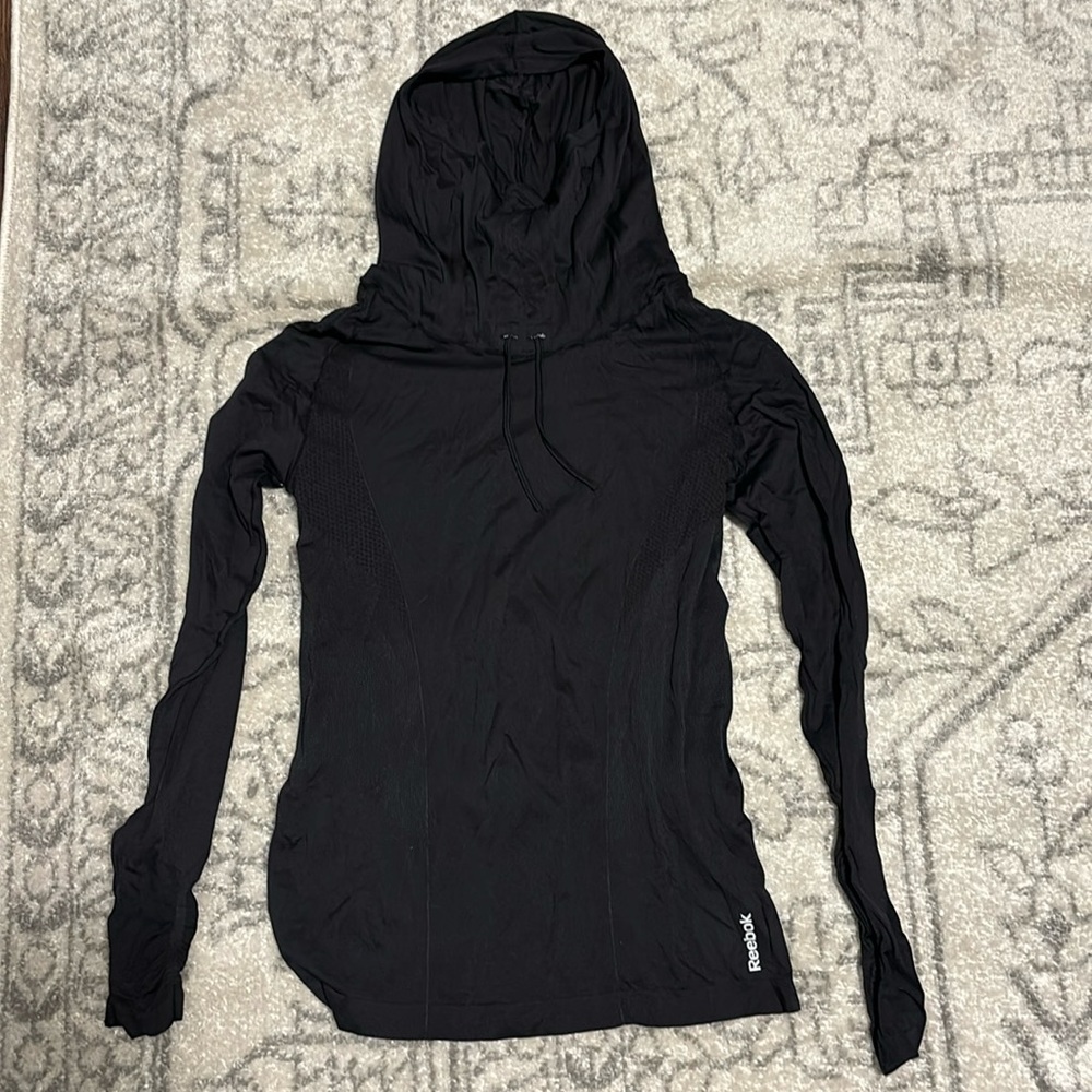Reebok pullover with hood.